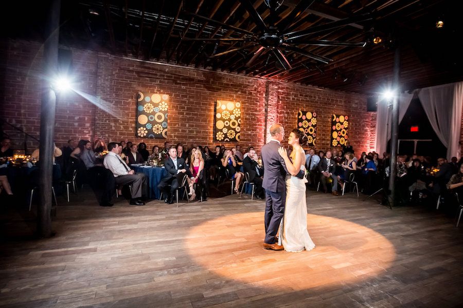 Bride and Groom First Dance Wedding Portrait with Exposed Brick Wall Backdrop at Modern, Downtown St. Pete Wedding Venue NOVA 535 | outdoor st. pete wedding