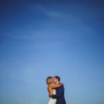 Bride Open Back Wedding Dress and Groom in Blue Suit Wedding Portrait in Downtown St. Pete