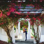 Bride Open Back Wedding Dress and Groom in Blue Suit Wedding Portrait in Downtown St. Pete
