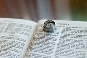 Bride and Groom Wedding Engagement Rings with Bible