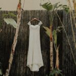 Davids Bridal Sheer Strap Lace Wedding Dress on Hanger in Bamboo Garden | Tampa Bay Wedding Venue NOVA 535