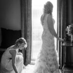 Bride in layered lace wedding dress