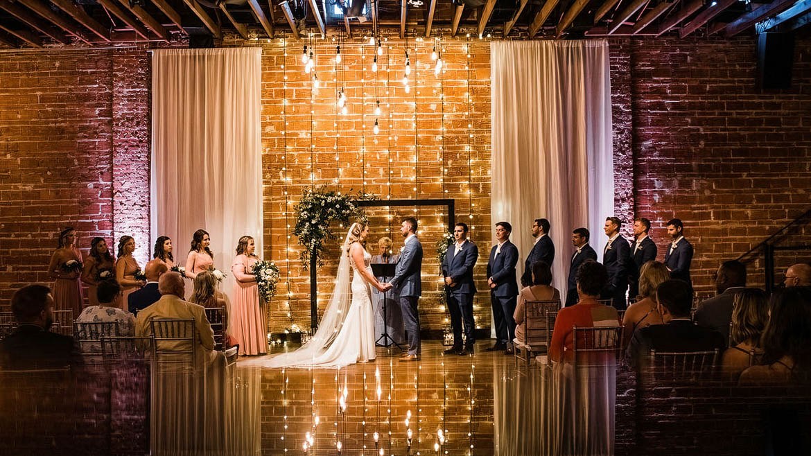 Gorgeous wedding ceremony inside of historic downtown St. Pete, Florida 5-star wedding venue NOVA 535, best rated event space in St. Pete Tampa