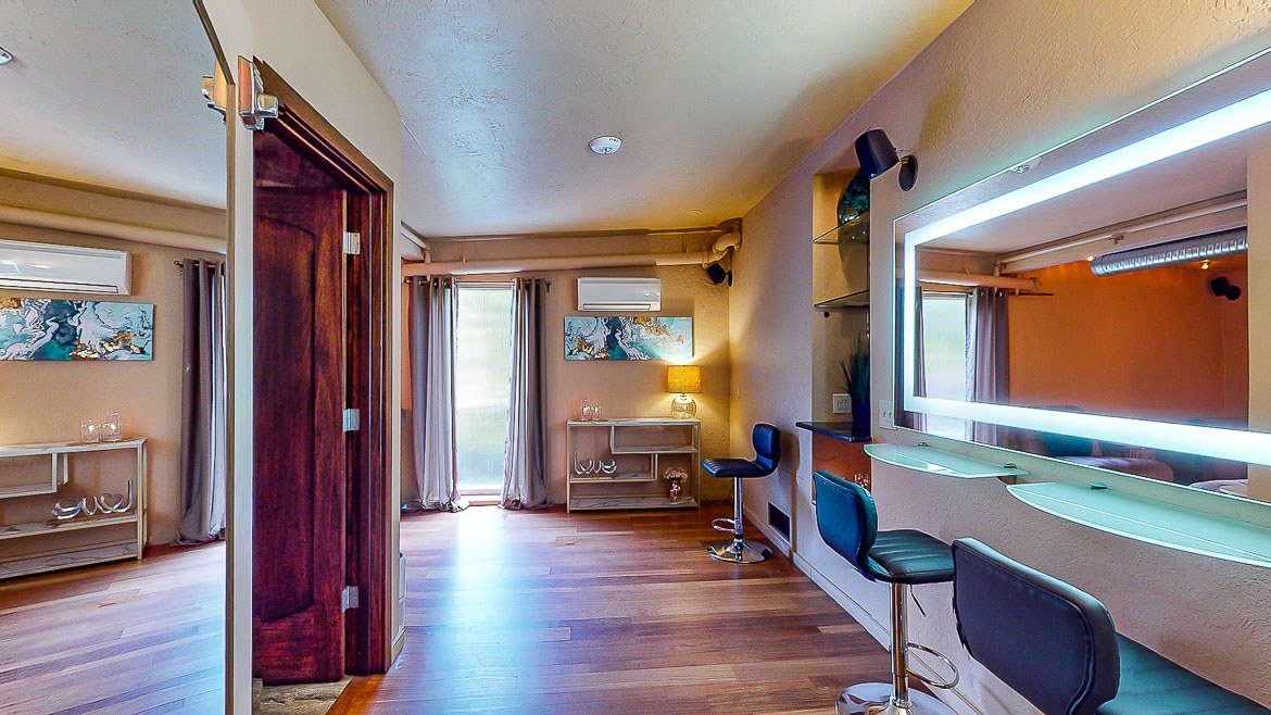 Historic Downtown St. Pete, Florida wedding venue NOVA 535 unique event space, upstairs Supernova bridal get-ready suite, makeup station and restroom with shower