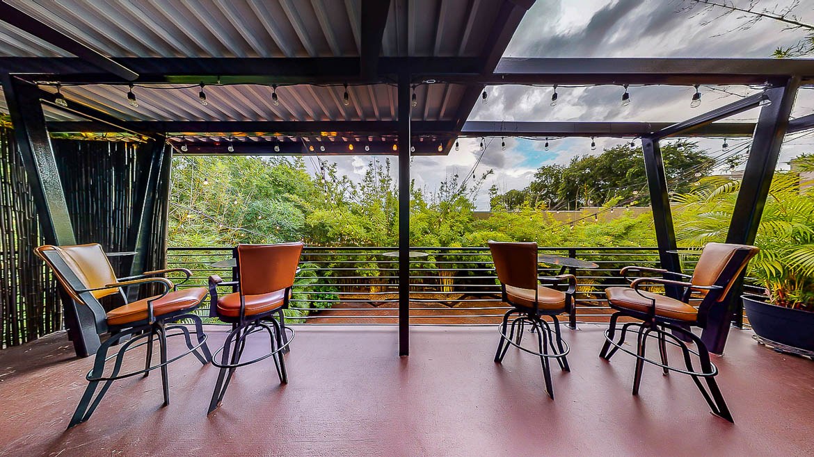 Upstairs outside balcony, overlooking our large, private, lush bamboo garden courtyard, here at 1920 built 5-star event venue NOVA 535, located in downtown St. Pete, Florida