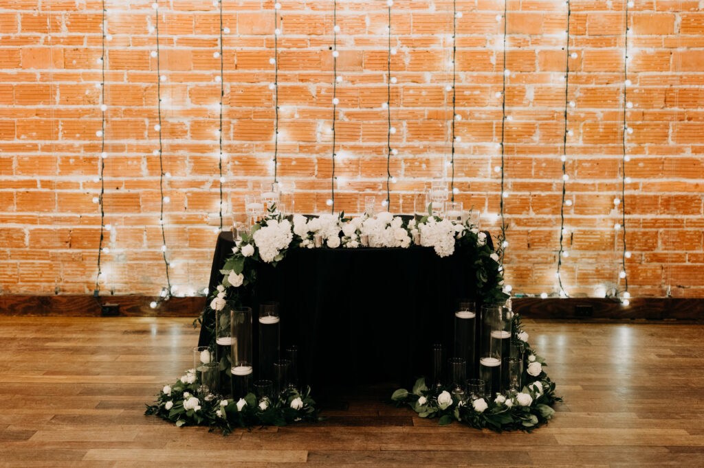 Timeless Black and White Wedding Reception Head Table with String Light Backdrop Inspiration | Tampa Bay Photographer Amber McWhorter Photography