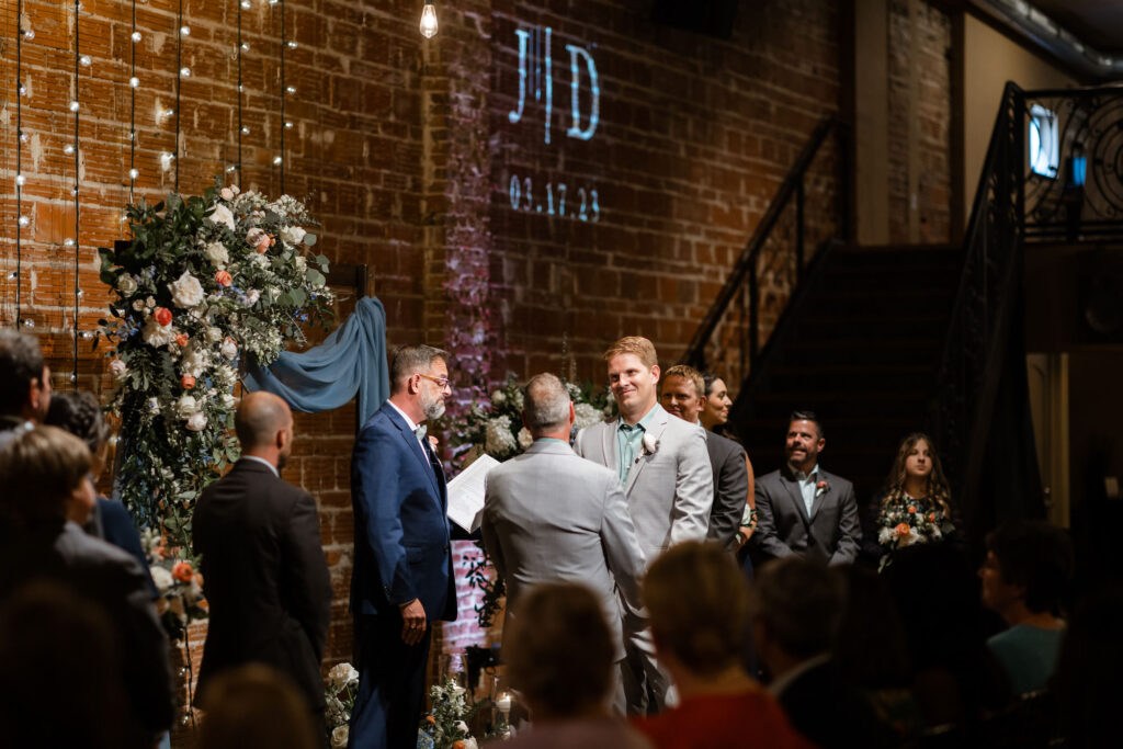 Same Sex Gay Wedding Grooms Exchanging Vows