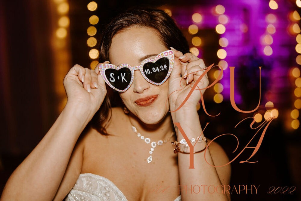 2024 Katy and Seth Red Black Orange and Gold Wedding Ceremony at historic downtown St. Pete Florida venue NOVA 535