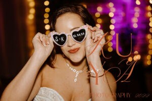 2024 Katy and Seth Red Black Orange and Gold Wedding Ceremony at historic downtown St. Pete Florida venue NOVA 535