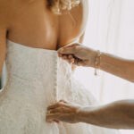 Tampa Bay Bride getting ready in strapless lace gown for St. Pete Wedding Ceremony at NOVA 535