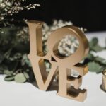 Gold Love wedding decor at card table