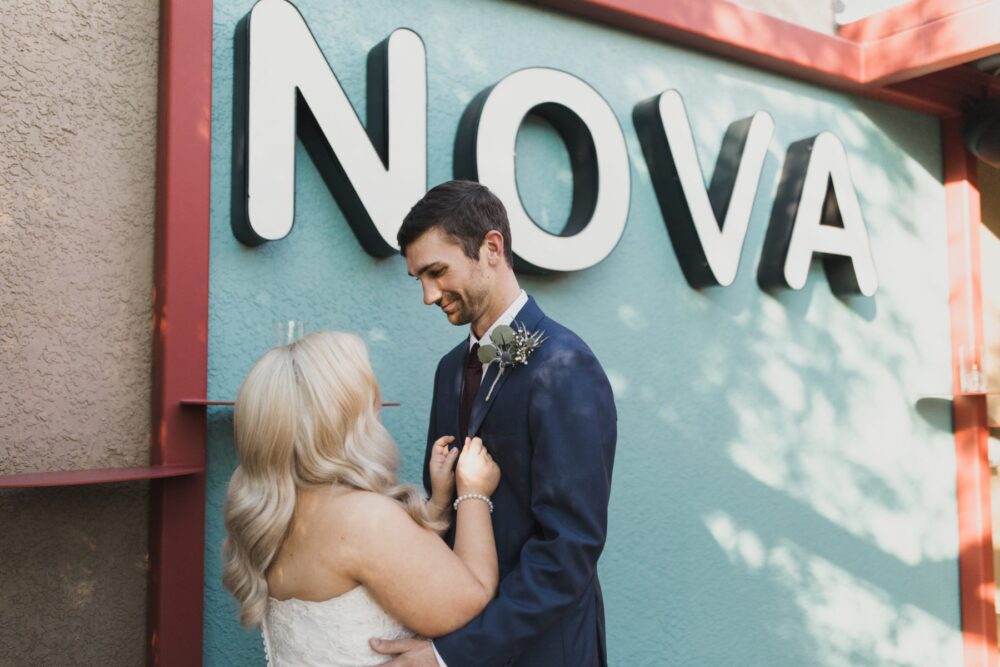 Bride and groom portrait outside NOVA 535 in St. Pete