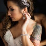 Bride in embellished strapless wedding dress with rhinestone headpiece